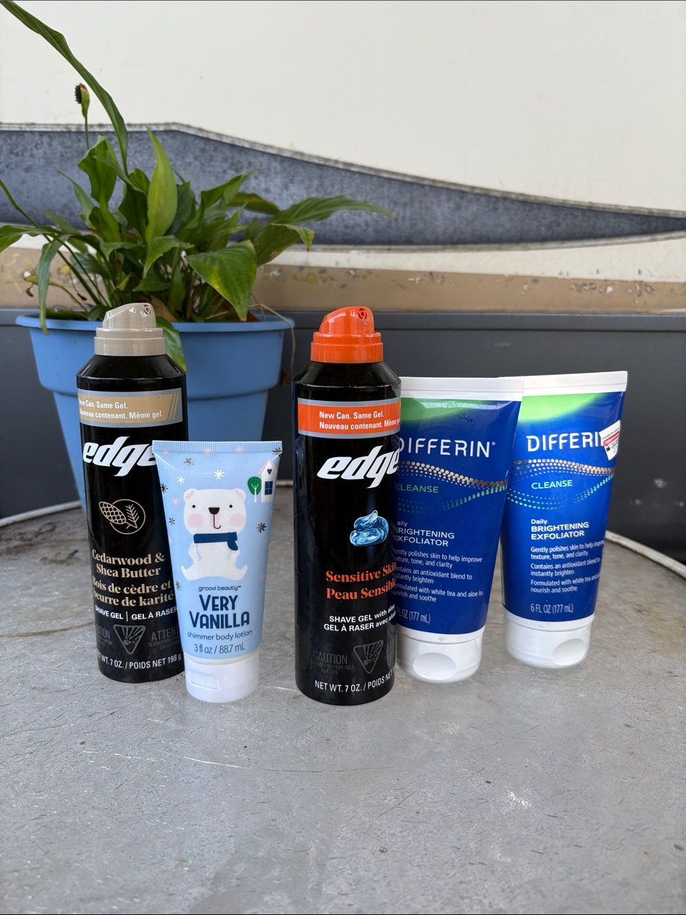 edge Sensitive Skin Shave Gel with Orange Cap and Black Bottle